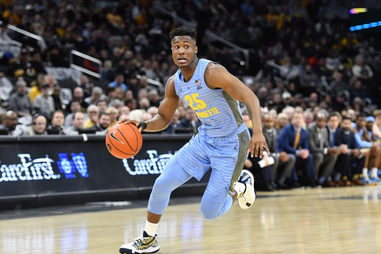 marquette-with-basketball